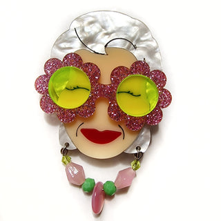 Iris brooch with floral sunglasses 