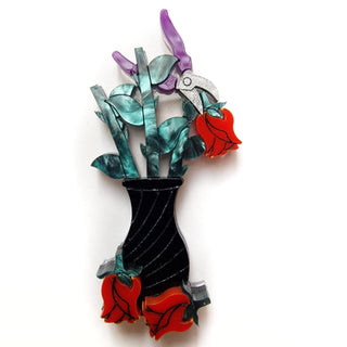 Pot brooch with roses...Morticia style