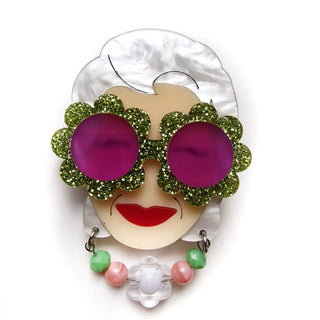 Iris brooch with floral sunglasses 