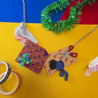 Collana Impacchetta i regali TIKI