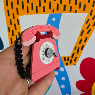 80s dynamic telephone brooch