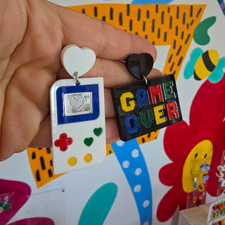 White GAME OVER earrings 